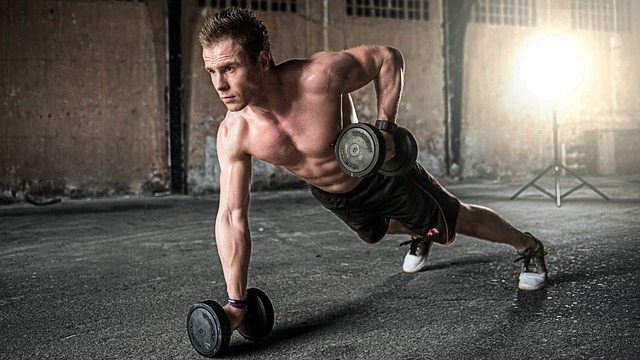 man with weights getting laid in bars